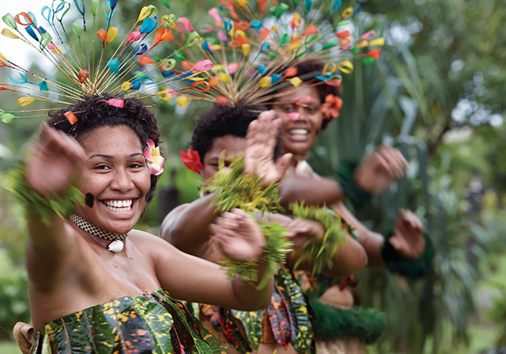 Fiji. Fiji Kvinnor som dancer sin traditionella dans 